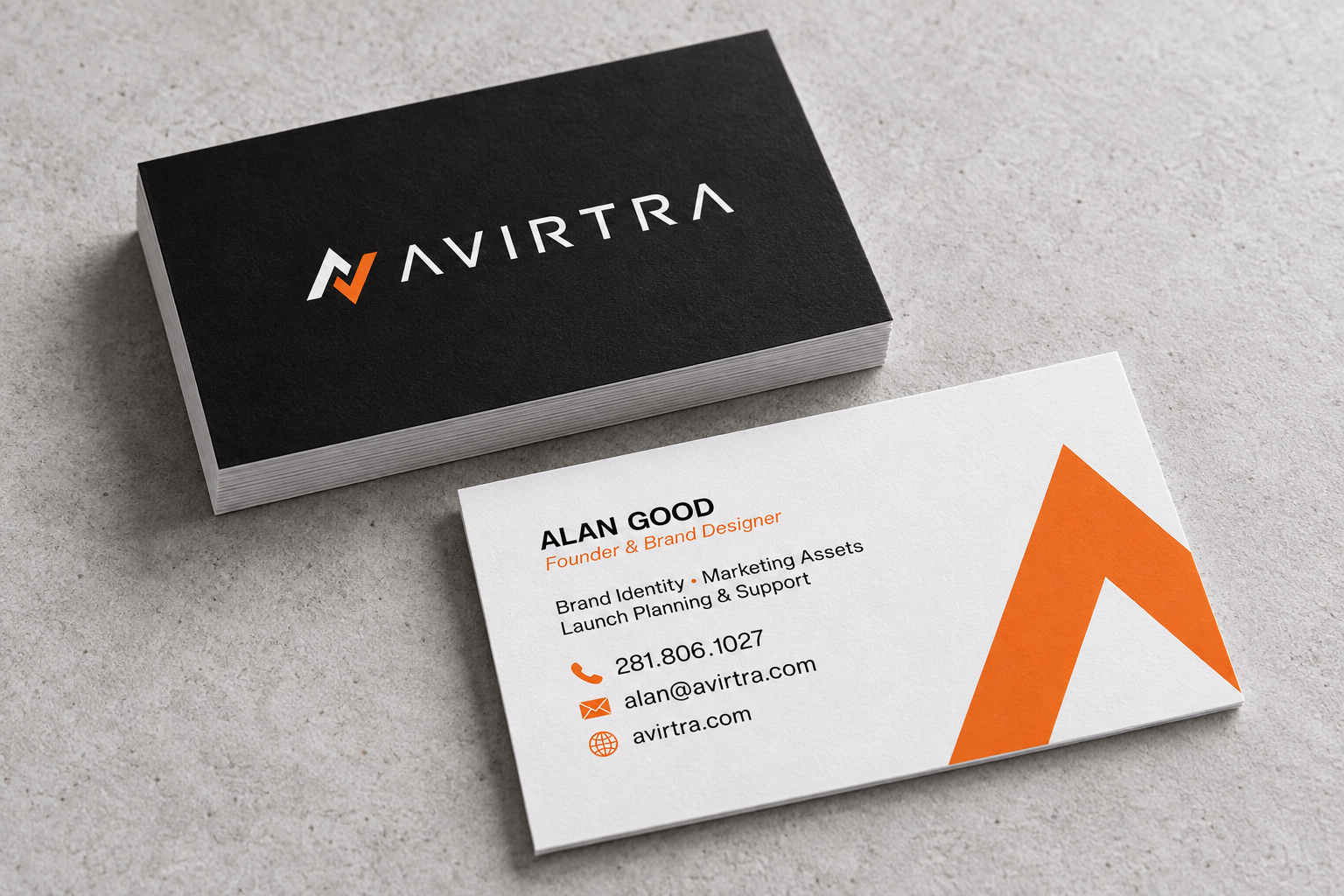 Studio mockup of Alan Good’s black, white and orange Avirtra business cards